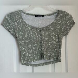 Green and white floral top